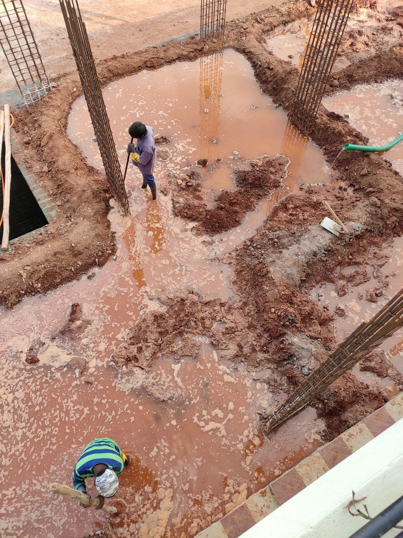 filling water to compress soil inside the site