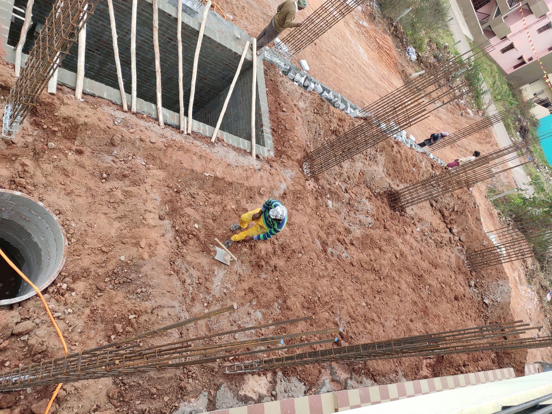 labour doing pond like structure to stop water